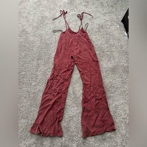 E2, red overall tie pants, size small, with side zip closure.